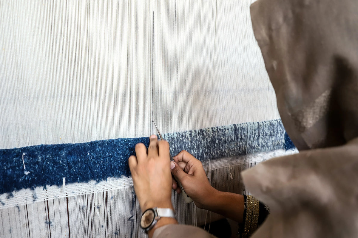Woven Lives: Meet Zahra, a Young Rug Weaver with a Dream