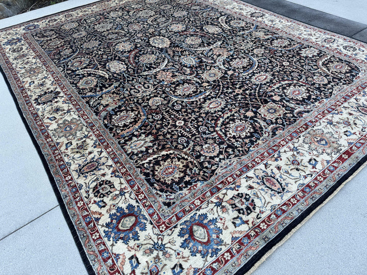9x12 Handmade Afghan Wool Rug | Black Floral Garden Area Rug with Ivory Border | Red and Blue Accents | Hand-Knotted Traditional Carpet