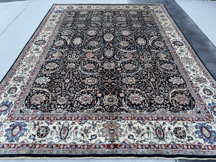 9x12 Handmade Afghan Wool Rug | Black Floral Garden Area Rug with Ivory Border | Red and Blue Accents | Hand-Knotted Traditional Carpet