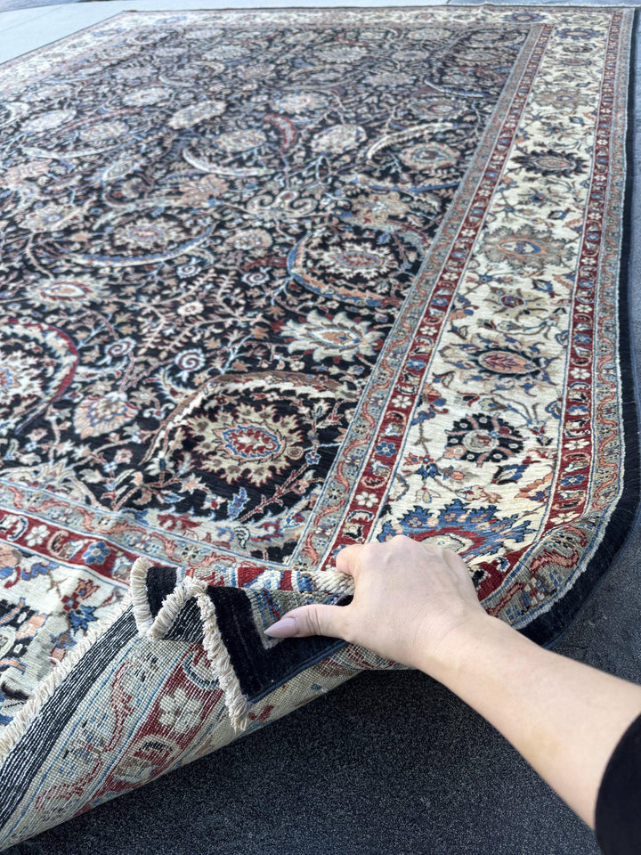 9x12 Handmade Afghan Wool Rug | Black Floral Garden Area Rug with Ivory Border | Red and Blue Accents | Hand-Knotted Traditional Carpet
