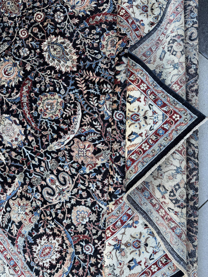 9x12 Handmade Afghan Wool Rug | Black Floral Garden Area Rug with Ivory Border | Red and Blue Accents | Hand-Knotted Traditional Carpet