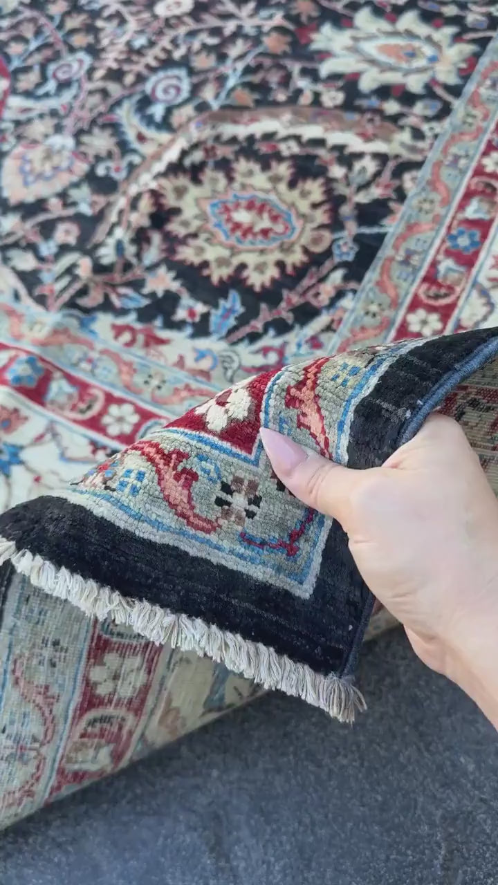 9x12 Handmade Afghan Wool Rug | Black Floral Garden Area Rug with Ivory Border | Red and Blue Accents | Hand-Knotted Traditional Carpet